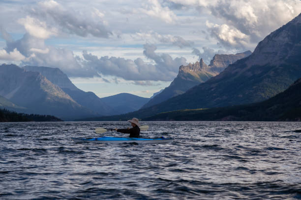 istock Man Kayaking in Glacier Lake 1179665499