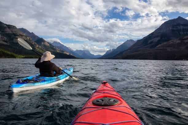 istock Man Kayaking in Glacier Lake 1179665573