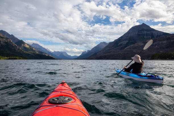 istock Man Kayaking in Glacier Lake 1179665577