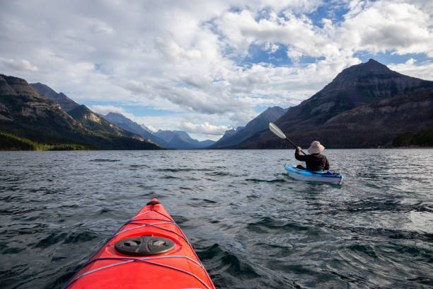 istock Man Kayaking in Glacier Lake 1179665581