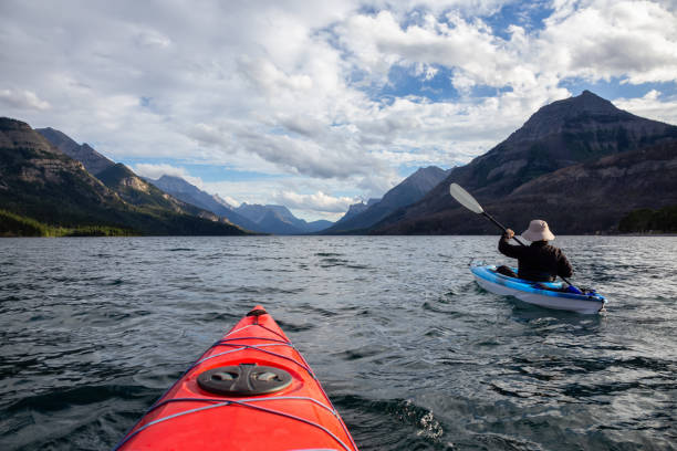 istock Man Kayaking in Glacier Lake 1179665591