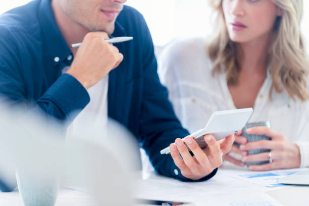 istock Young Couple working on their home finances. 1179667631
