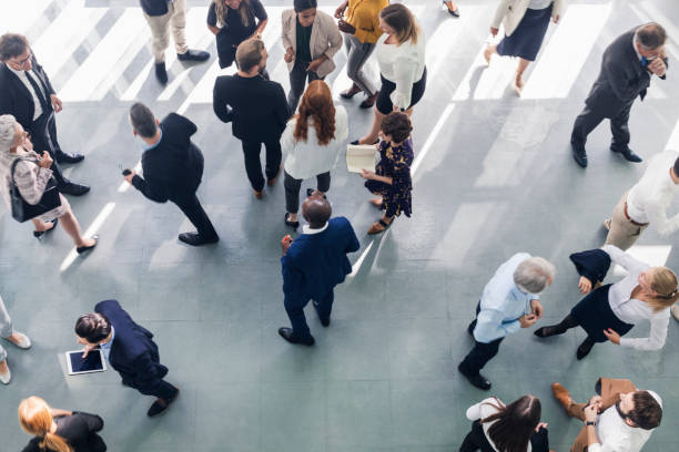 istock Overhead view of business people at work 1179667760