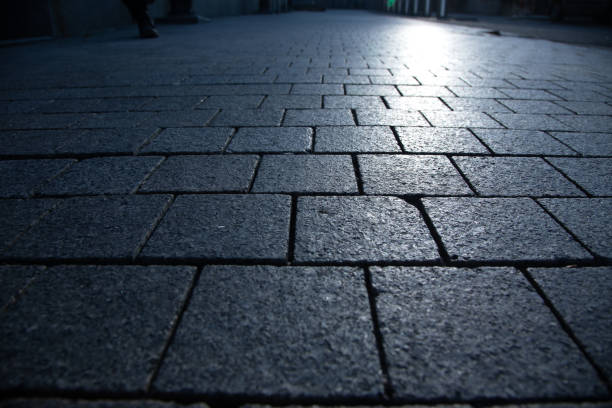 istock Dark grey pavement close-up in isometric 1179670088