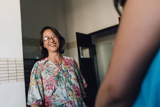 istock Smiling Asian women in the kitchen 1179672615