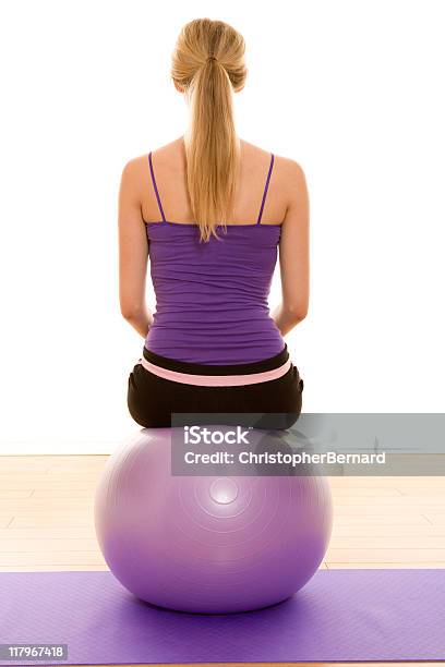 Female Working Out With An Excercise Ball Stock Photo - Download Image Now - 20-24 Years, 25-29 Years, Adult