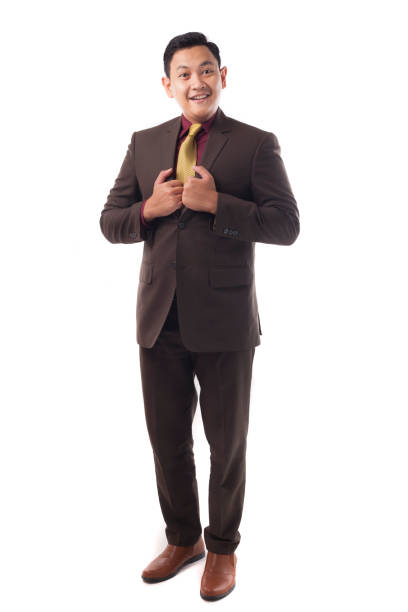 istock Young Asia Businessman Standing Straight Gesture, Smiling Expression 1179675470