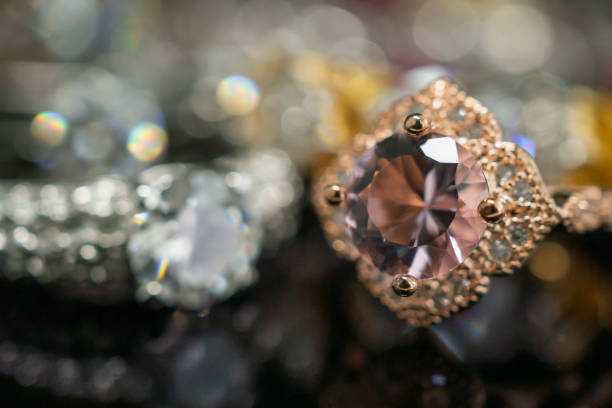 istock Jewelry wedding diamond rings on black background with reflection 1179678836