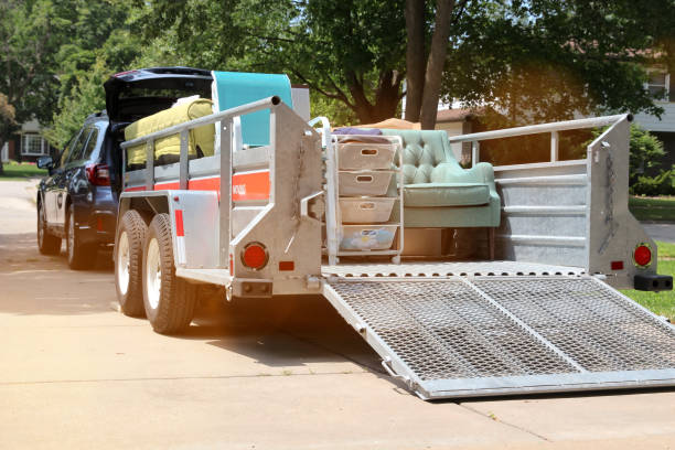 moving van with car  is outside on the street moving van with car  is outside on the street trailer stock pictures, royalty-free photos & images