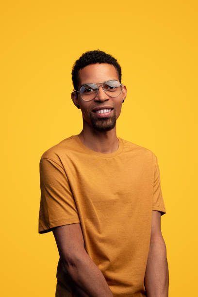 istock Vertical shot of black man on color background 1179680220