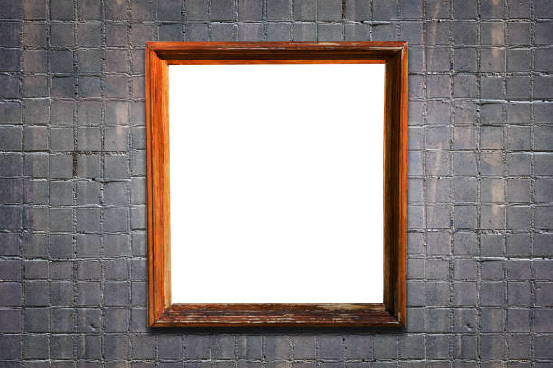 istock wooden brown frame on stone gray wall 1179681310