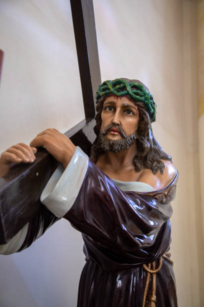 istock jesus carrying the cross saint catholic statue in brazil 1179689368