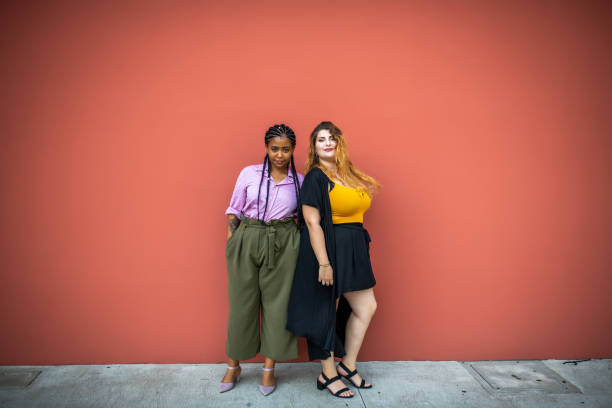 istock Two beautiful girls looking at the camera. 1179690943
