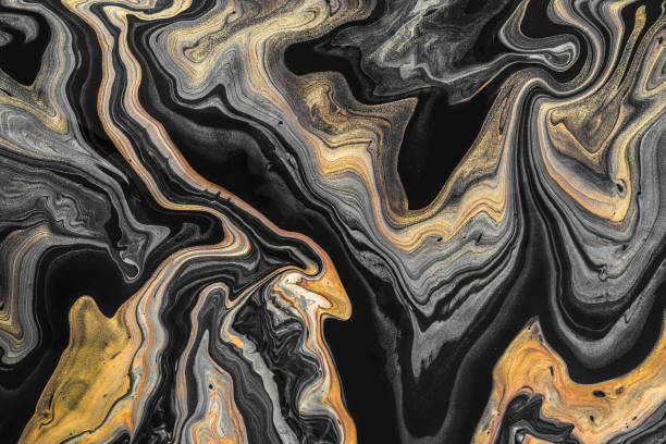 istock Fluid Art. Golden and black wave pattern. Luxury Marbleized effect. Abstract background or texture 1179695882