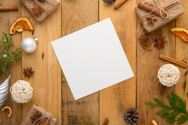 istock Christmas wooden ventilation background with empty postcard, layout for design and gifts, Christmas tree and cinnamon. Background for greeting card or Happy New Year 1179696464