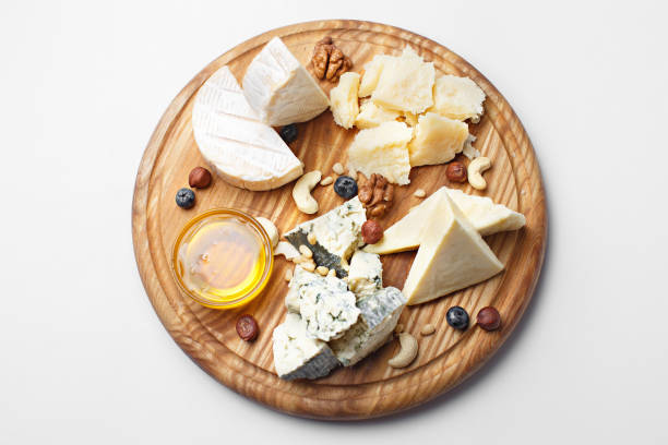 istock different cheeses sliced on wooden board 1179697433
