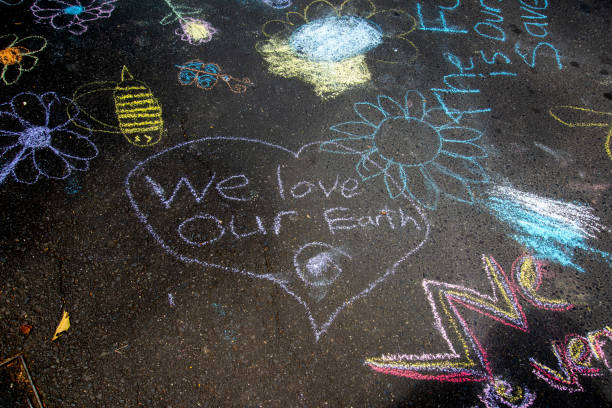 istock Child's drawings on a bitumen road. 1179709151
