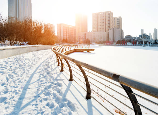 City sidewalk in snowy day.