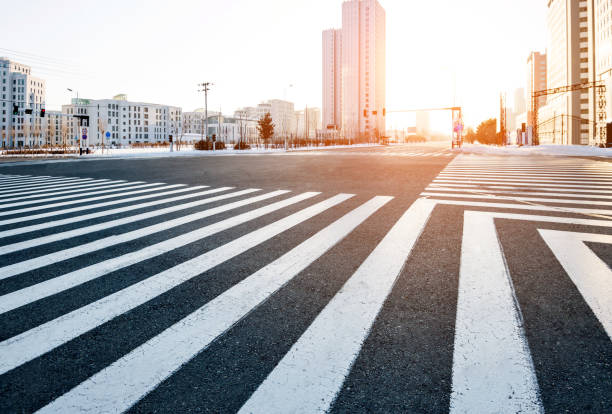 istock Zebra crossing and modern buildings in winter 1179714308