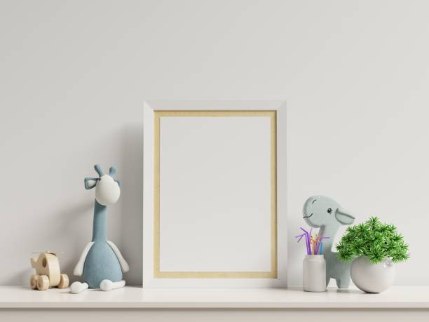 istock Mock up posters in child room interior, posters on empty white wall background. 1179714422
