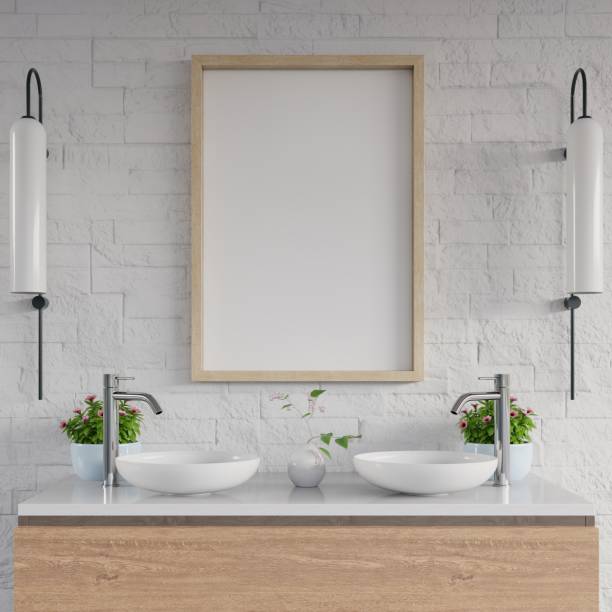 istock White bathroom sink standing white mockup poster on cabinet shelf. 1179714438