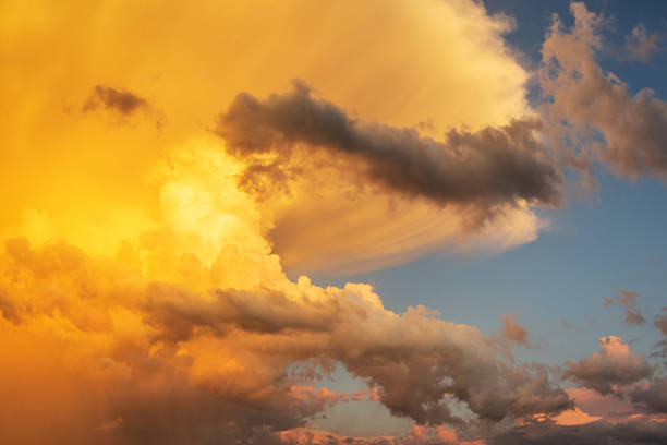 istock Clouds and sky at sunrise and sunset, orange and red colors. 1179715106