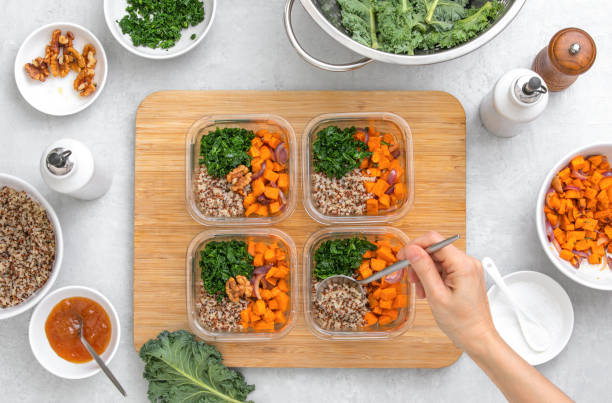 istock Preparing healthy vegetarian food ahead in lunch boxes, top down view 1179718252