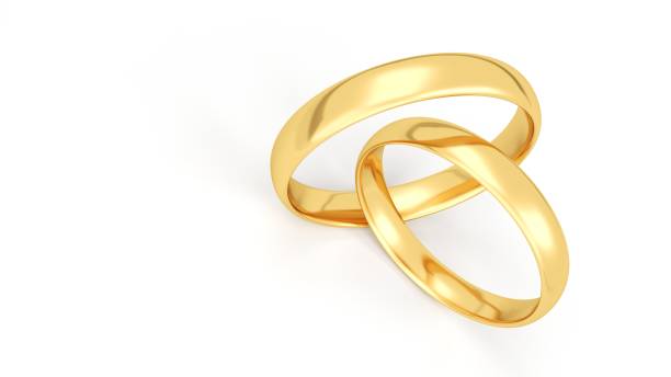 istock Gold wedding rings isolated on white background. 1179720609