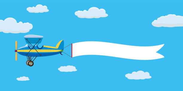 istock Red retro airplane aircraft with advertising banner ribbon in the cloudy sky. Vector isolated illustration 1179723042