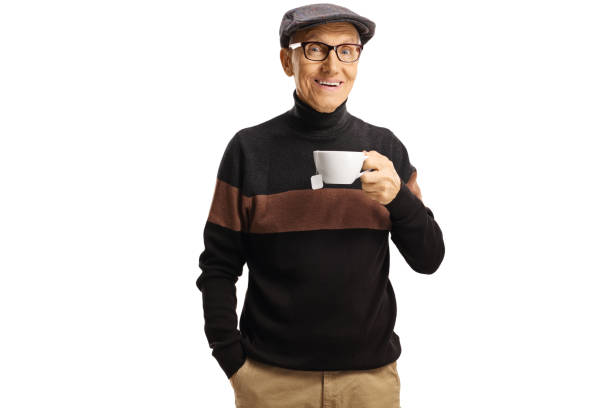 istock Elderly man posing with a cup of tea 1179729785