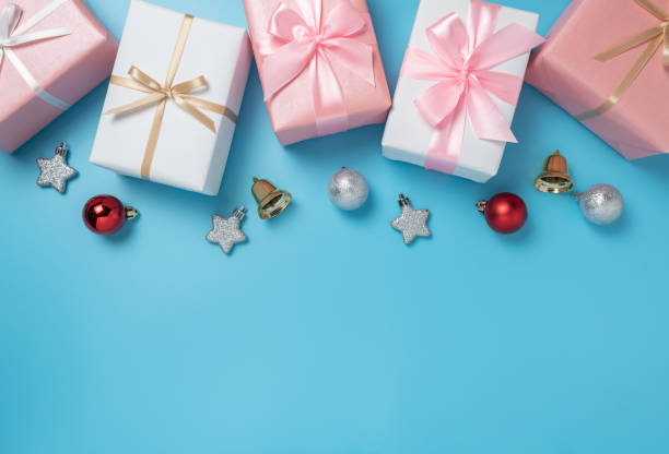istock Colorful gift boxes decoration on blue isolated background with copy space. Christmas, Birthday and New year concept. 1179730036