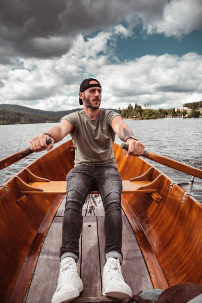 istock man rowing in the lake 1179731039