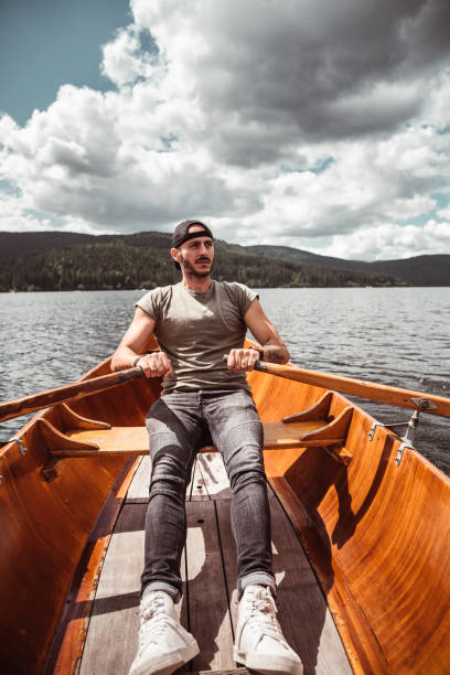 istock man rowing in the lake 1179731216