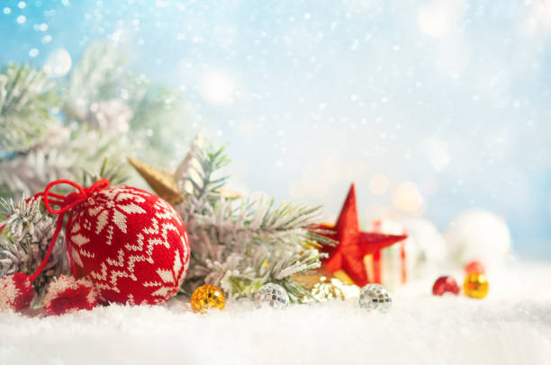 istock Christmas winter background with Christmas baubles and fir tree branches 1179731515