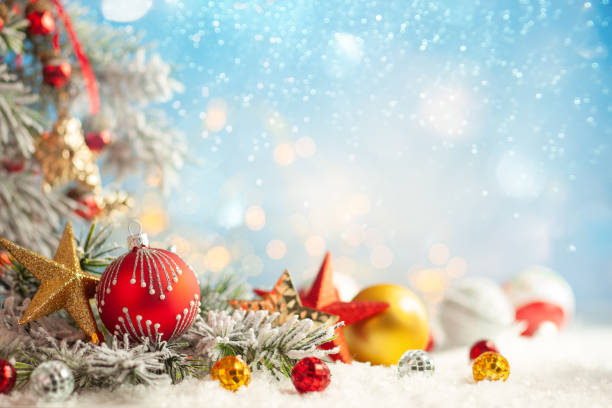 istock Christmas winter background with Christmas baubles and fir tree branches 1179731518