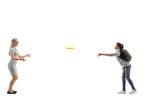 istock Two female friends playing with a plastic disc 1179731542