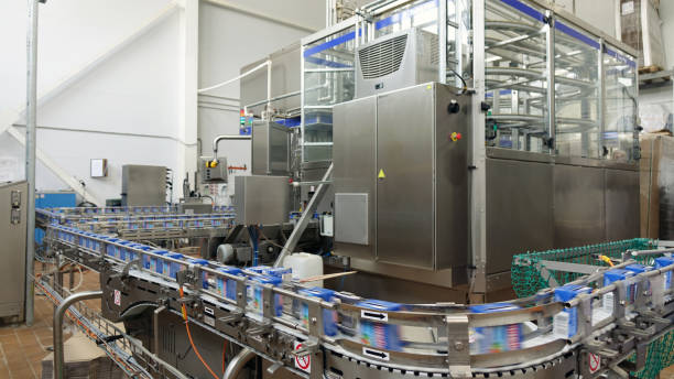 Conveyor line at the dairy plant. automatic production line stock photo