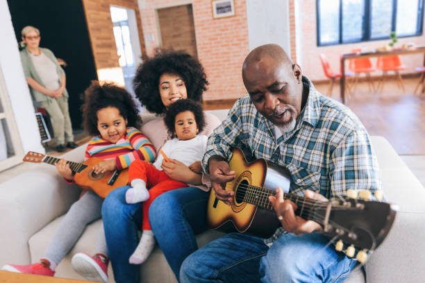 istock Grandpa plays guitar 1179734150