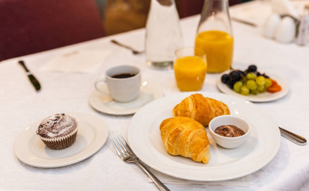 istock Breakfast with croissants and cup of coffee 1179735635