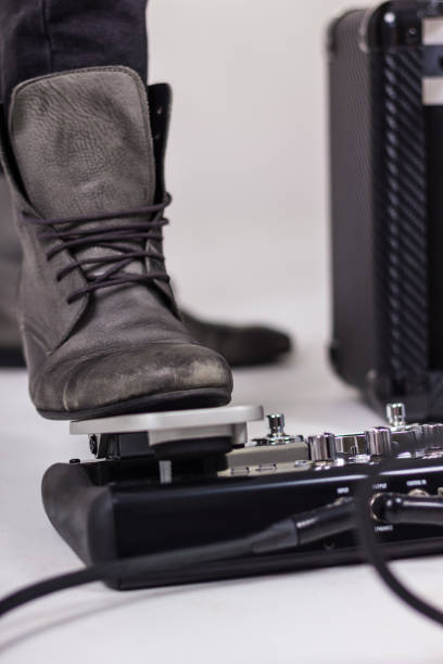 istock Close-up of musician using wah-wah pedal. 1179735657
