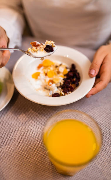 istock Young woman having oatmeal for breakfast 1179735901