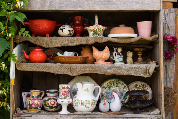 istock garden, kitchen tools and flowerpots on wood shelf 1179739987