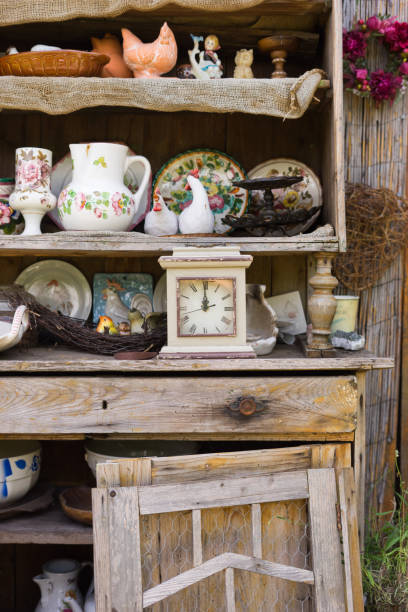 istock garden, kitchen tools and flowerpots on wood shelf 1179740460