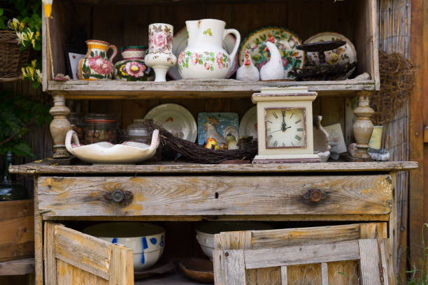 istock garden, kitchen tools and flowerpots on wood shelf 1179740478