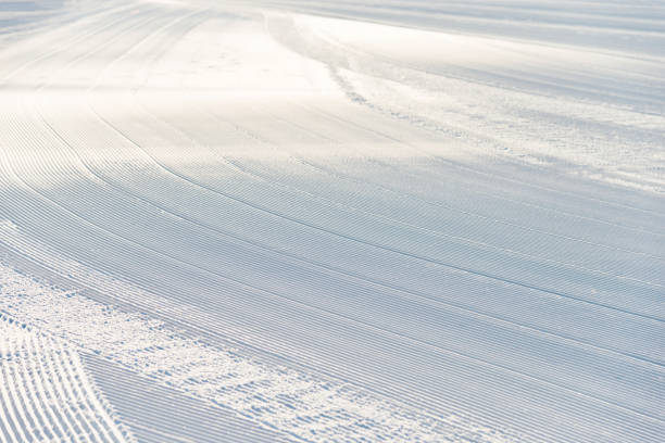 Newly groomed ski slope background.