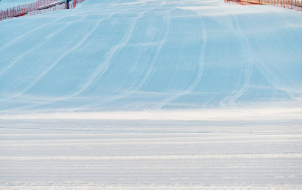 istock Newly groomed ski slope background 1179741854