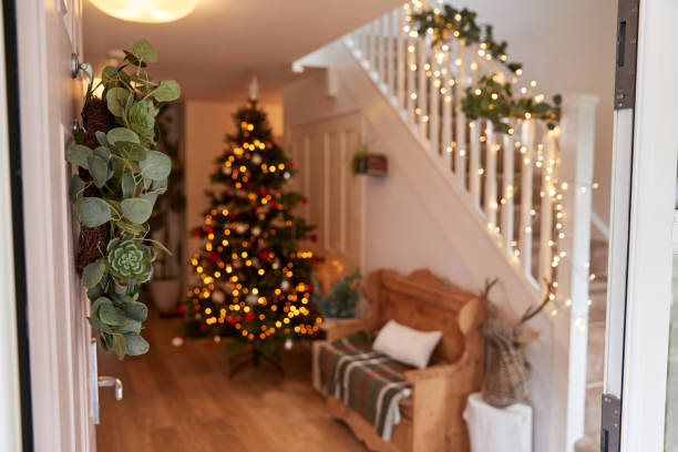 istock Hallway Of Home Decorated For Christmas Viewed Through Front Door 1179742043