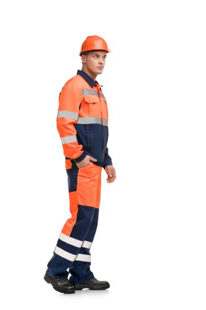 istock Man in working clothes and helmet profile view 1179744463