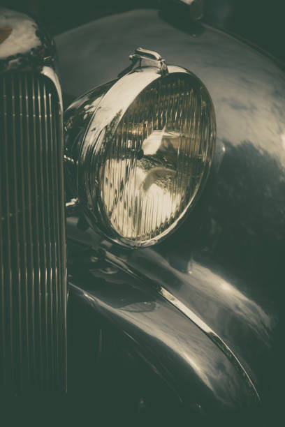 istock Headlight of a vintage classic car 1179747838
