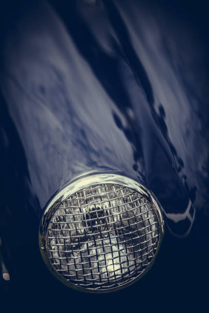 istock Headlight of a vintage classic car 1179747840